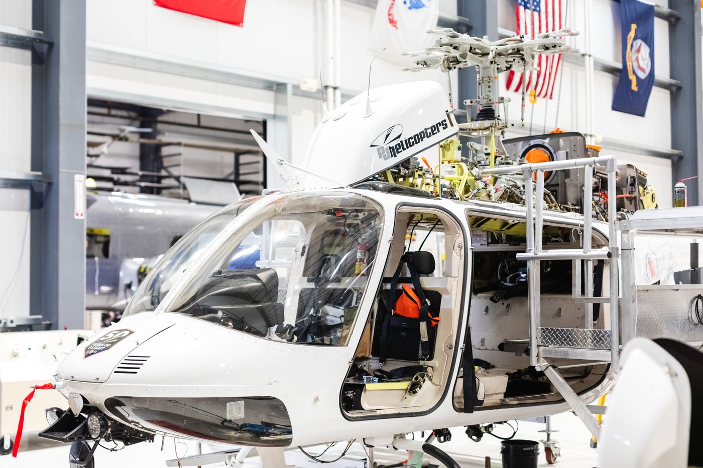 A helicopter airframe under maintenance in a Tehama County shop